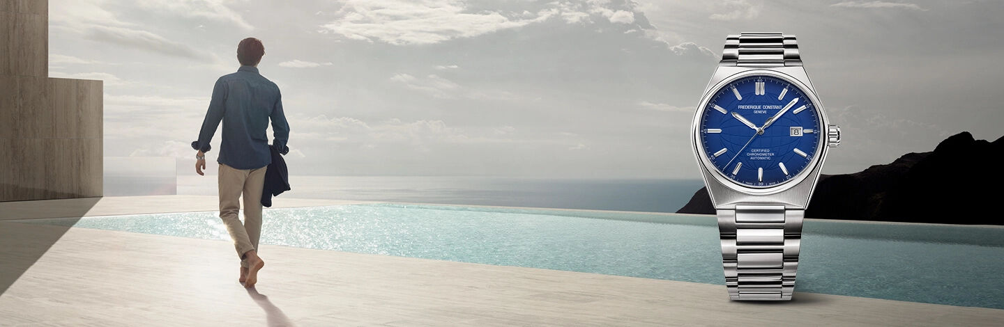 Man walking by a pool with a Frederique Constant Watch