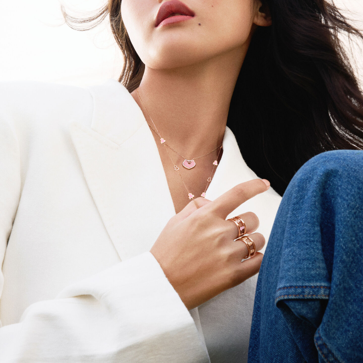 A woman wearing YuYi collection jewellery by Qeelin.