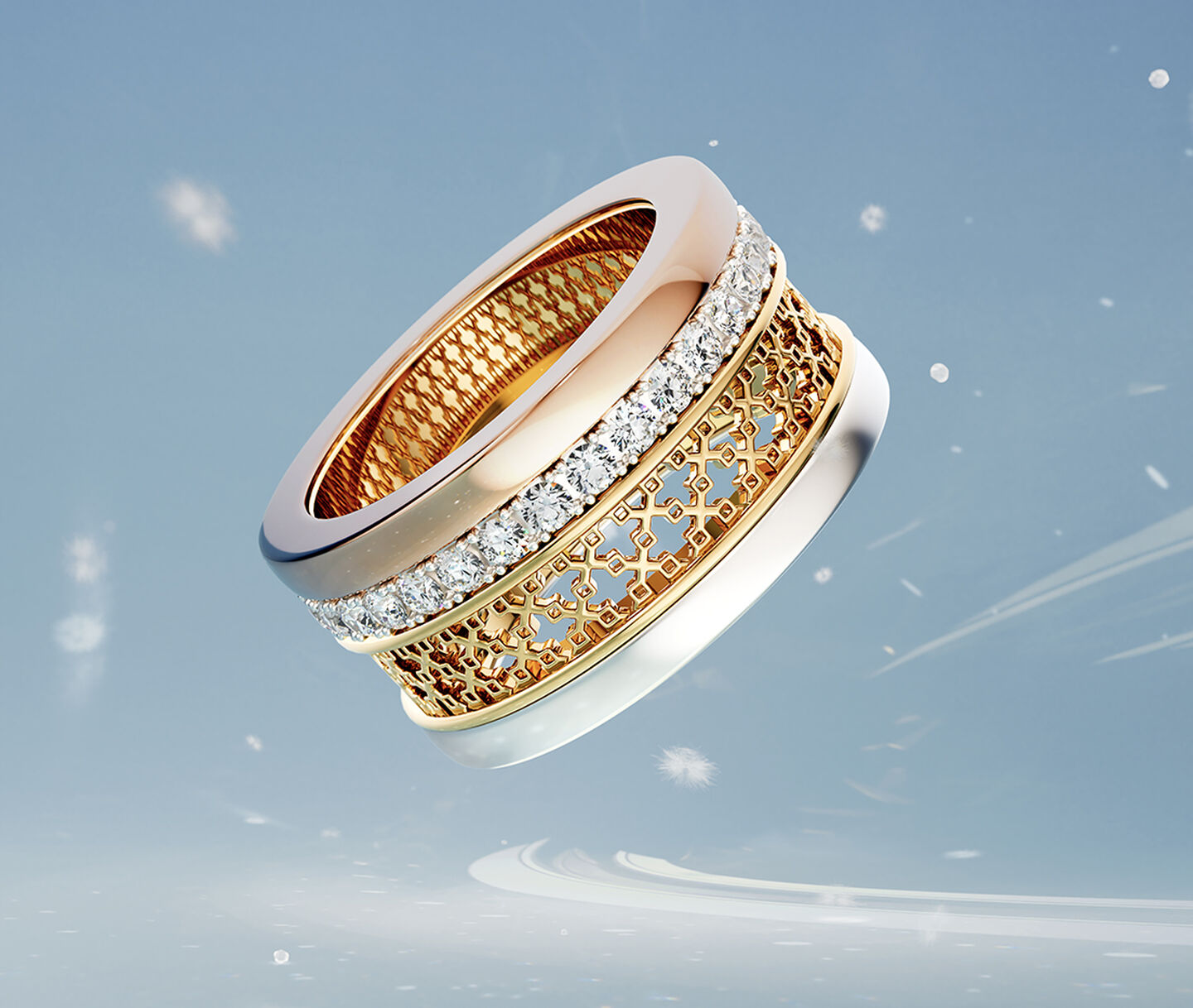 Birks Dare to Dream tri-gold ring on a sky background.