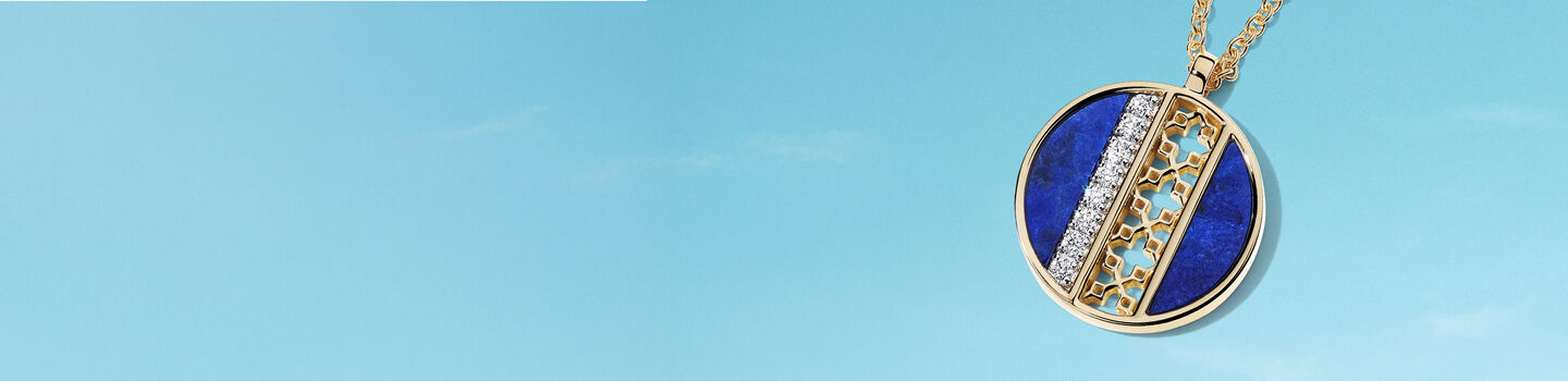 Birks Dare to Dream lapis-lazuli necklace on a blue background