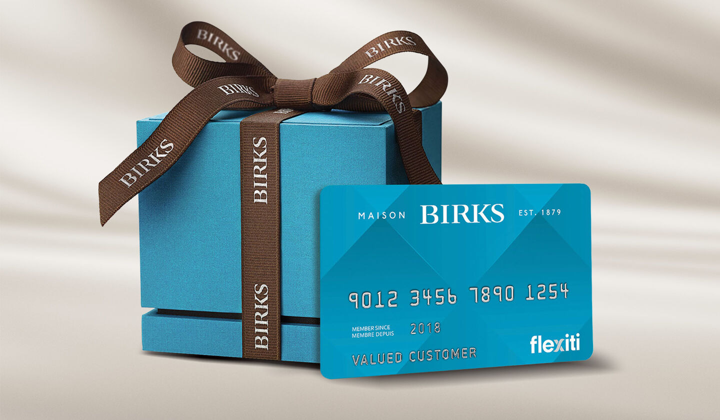 Une carte Flexiti Maison Birks avec une bo&icirc;te bleu. 