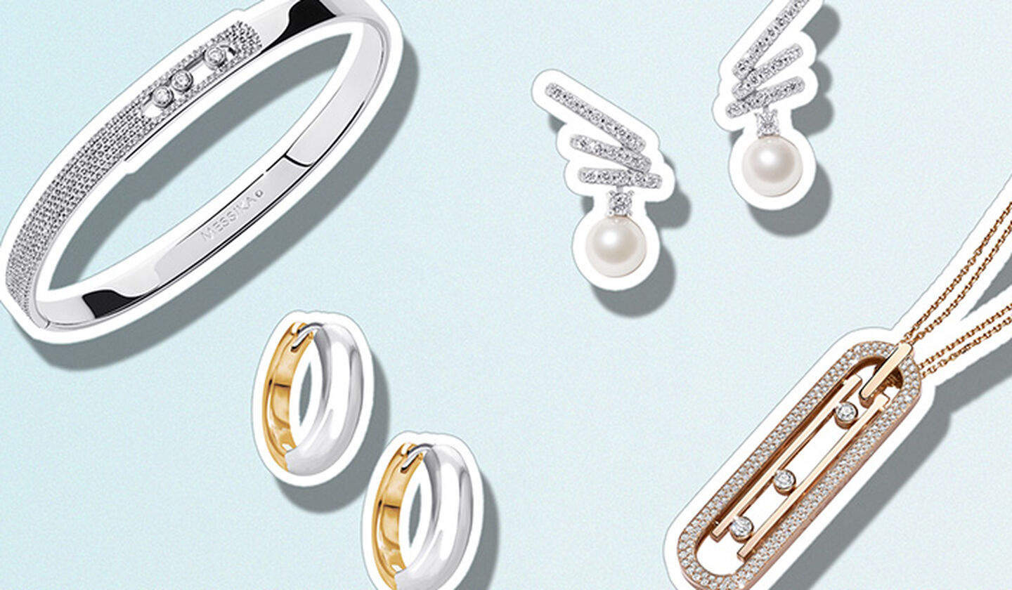 An assortment of jewellery from Maison Birks on a light blue background.