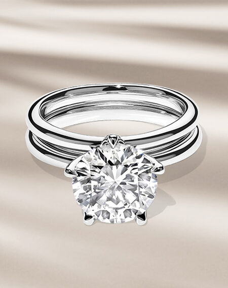 Birks North Star engagement ring on a beige background.