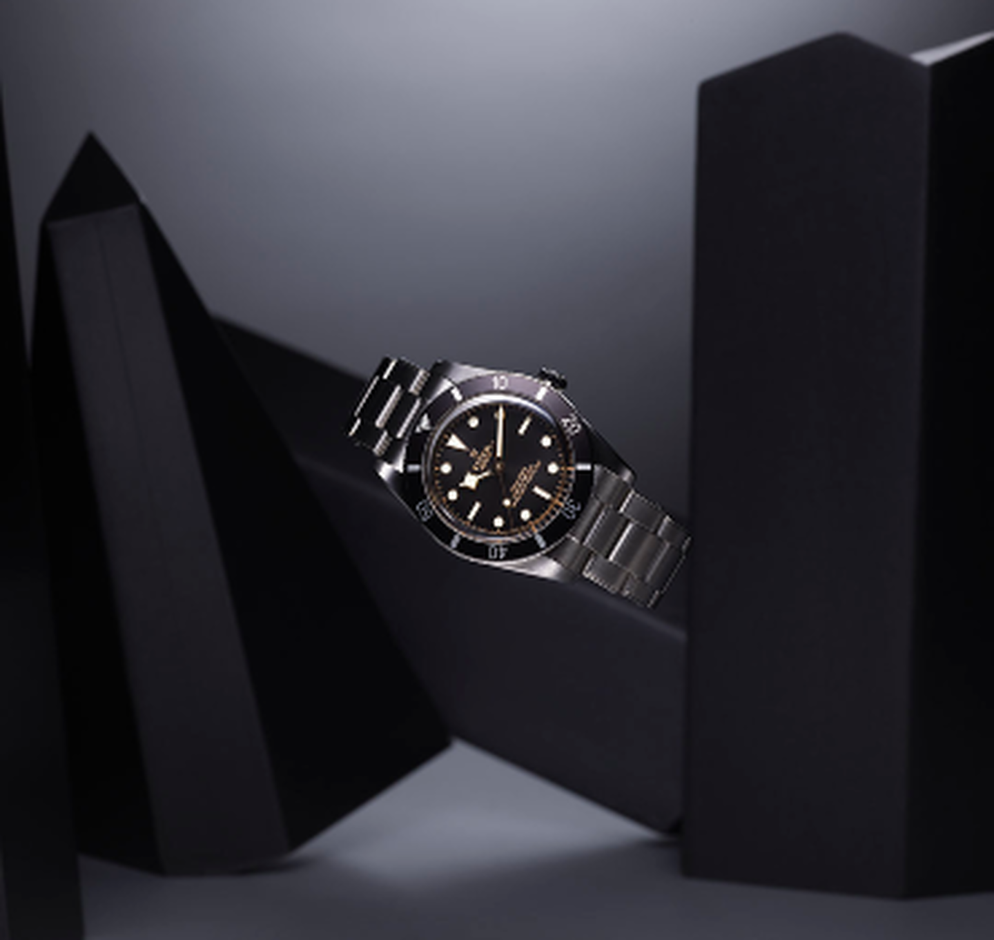 Tudor Black Bay watch on a black background