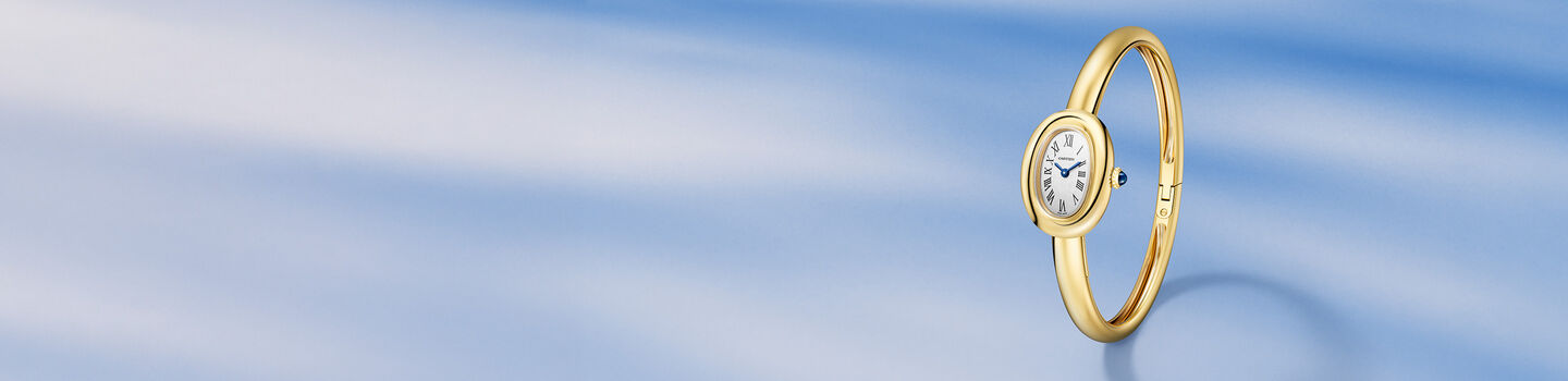 Baignoire de Cartier watch on a blue background.