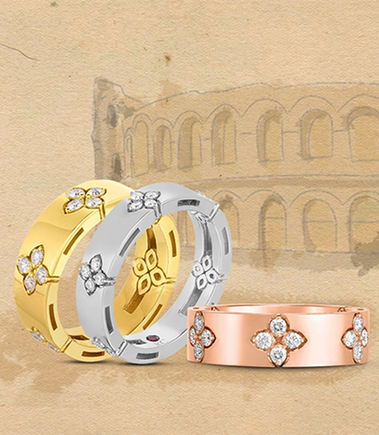 Three Roberto Coin yellow, white and rose gold rings with diamond flower accents