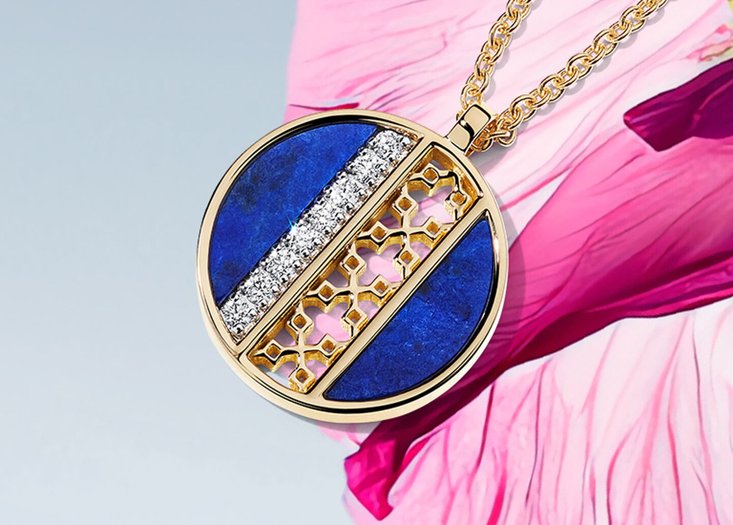 Birks Dare to Dream lapis lazuli and diamond gold medallion on a floral background.