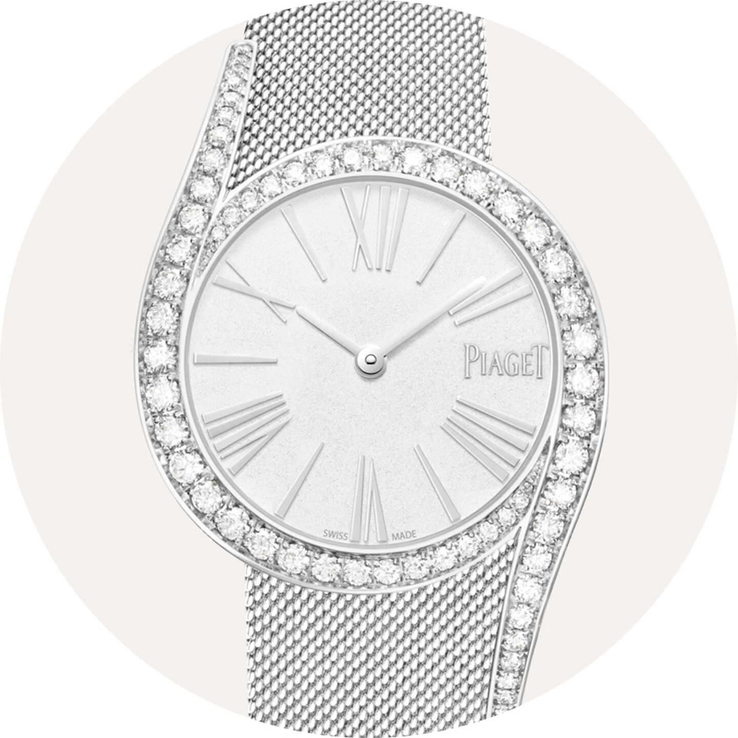 Piaget watch on a grey background.
