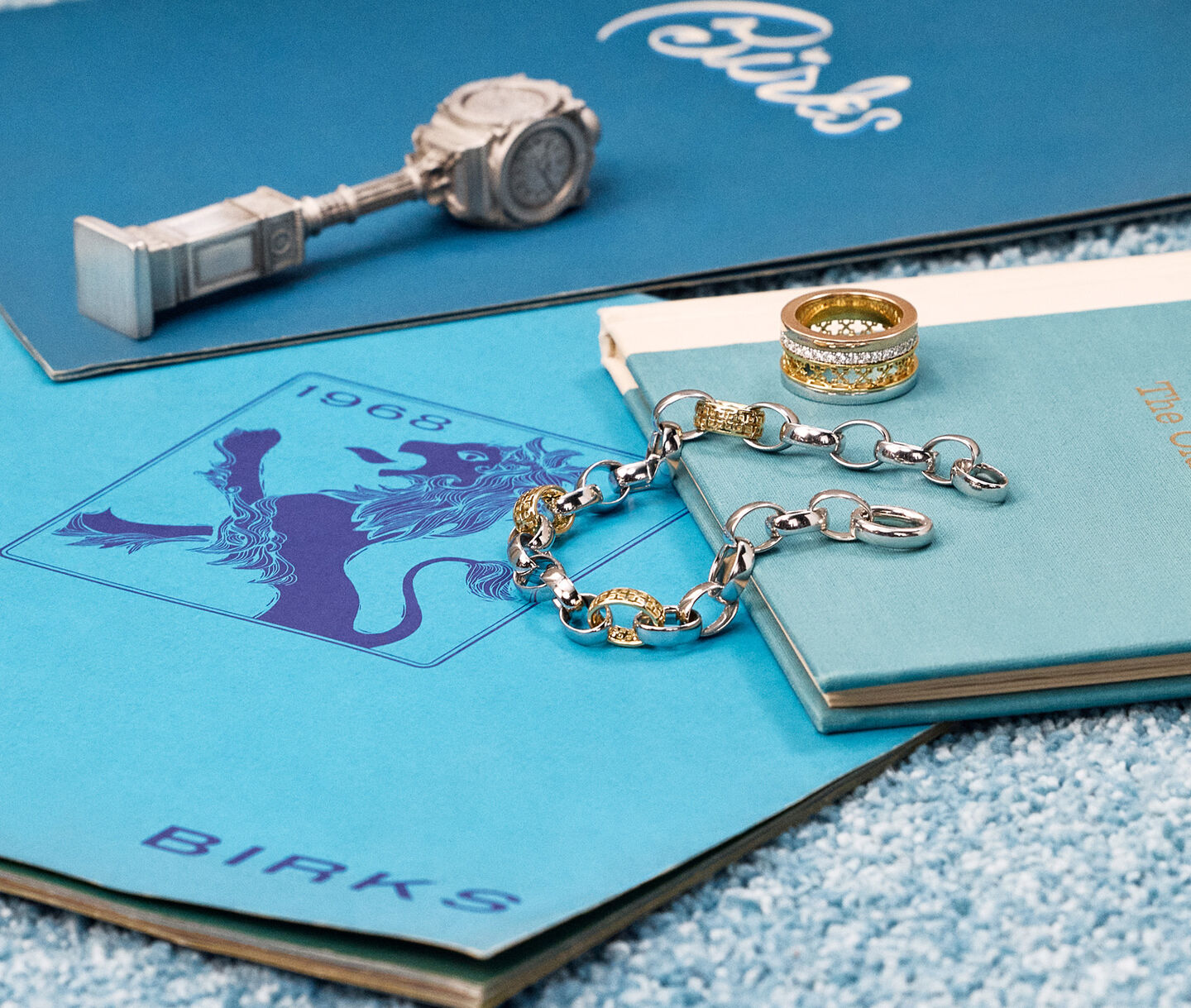 Birks jewellery, rings and bracelet displayed with vintage keepsakes and family memorabilia