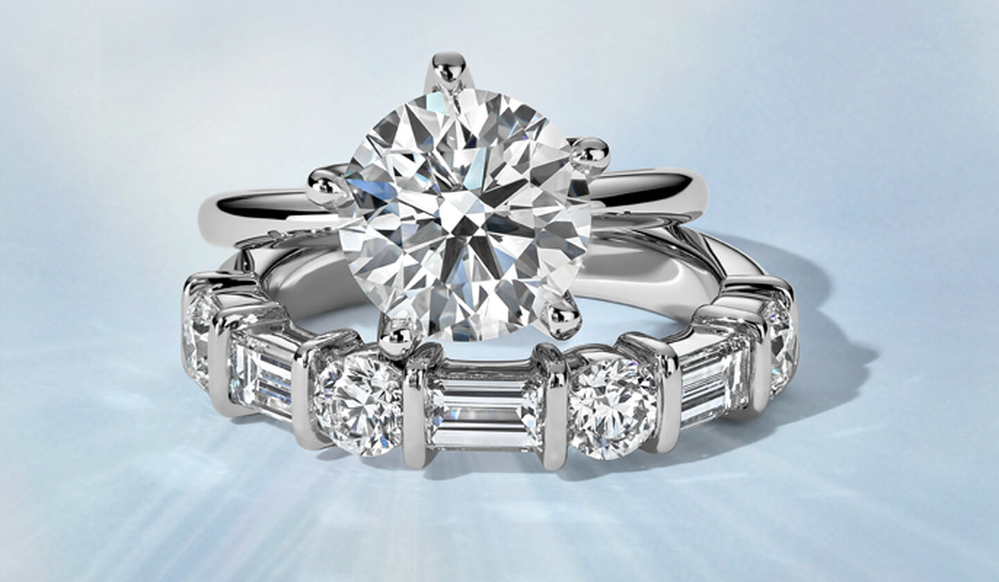 A Birks North Star Diamond Engagement Ring on a blue background.