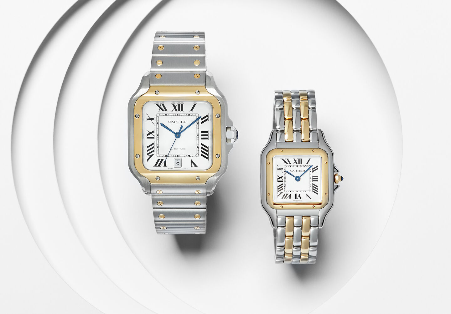 A Cartier de Santos and Panthère de Cartier watch on a white background