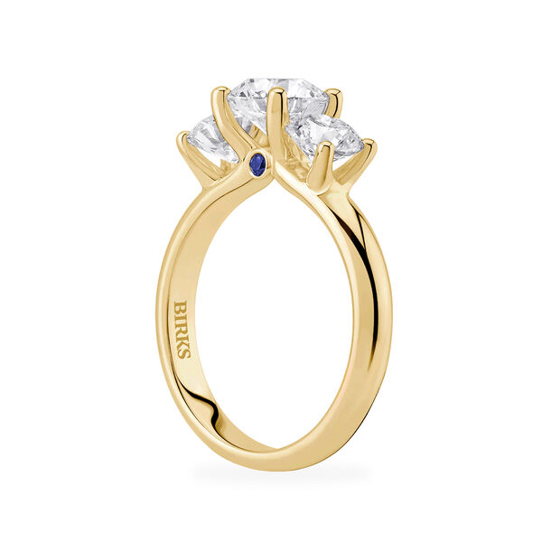 Bague de fiançailles en or jaun à trois diamants ronds avec accent saphir
