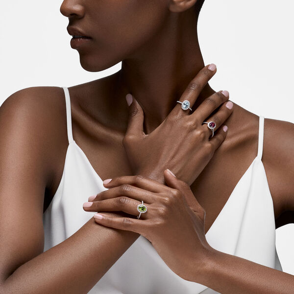 Oval-Cut Aquamarine Ring with Halo and Pav&eacute; Band