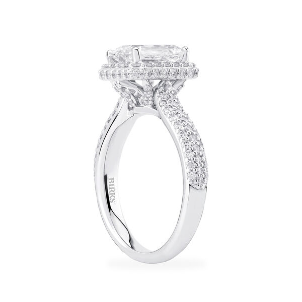 Emerald Cut Diamond Engagement Ring With Single Halo And Diamond Band