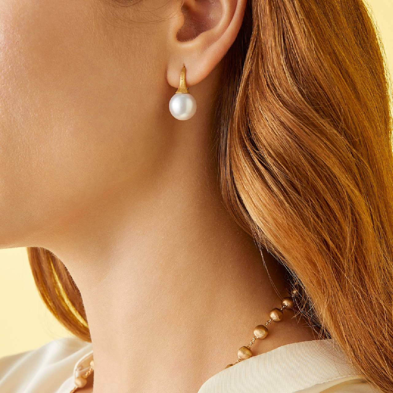 Marco Bicego Africa Yellow Gold Pearl Earrings On Model image number 1