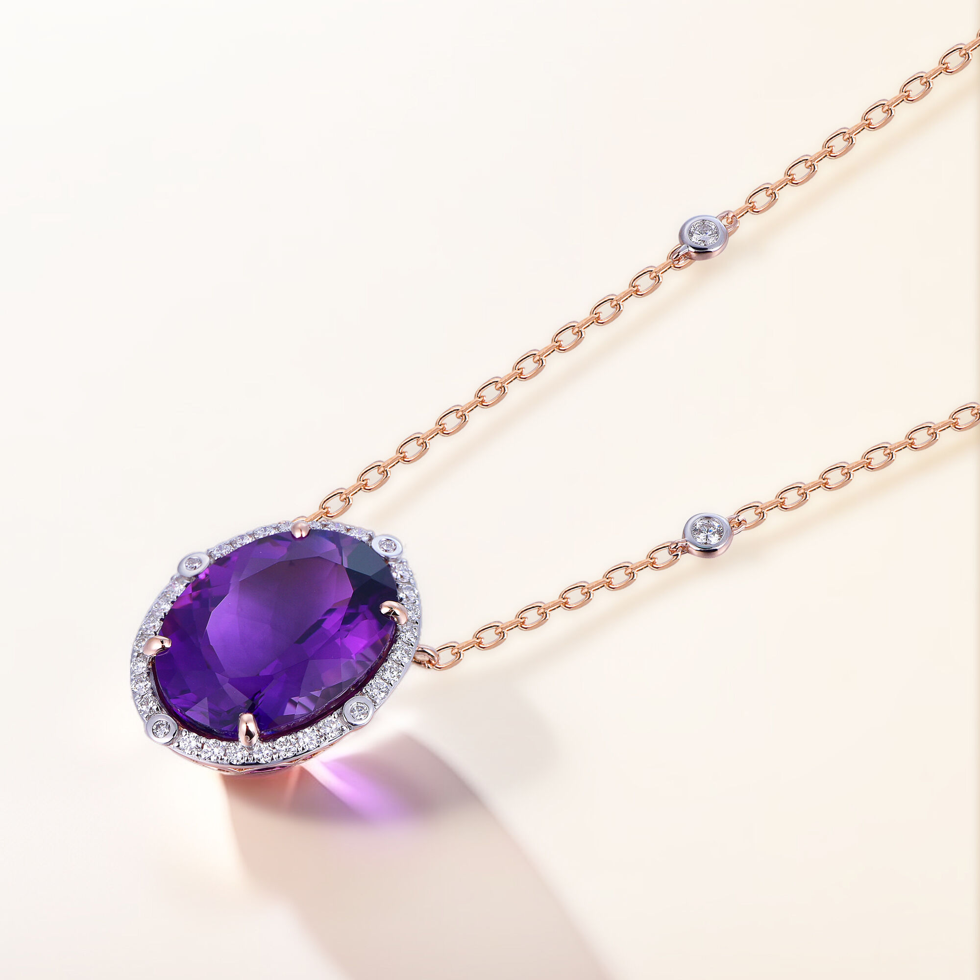 Oval Amethyst Pendant with Diamond Halo in Rose Gold
