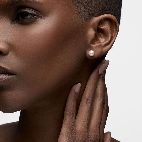 On-model view, 6.5&ndash;7mm Akoya pearl stud earrings set in 18K yellow gold image number 1