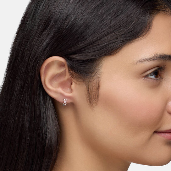 Birks Iconic Silver Muse Huggie Earrings on model image number 2
