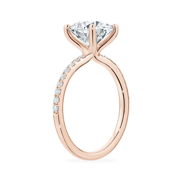 Bague de fiançailles en or rose à diamant solitaire rond avec anneau serti de diamants