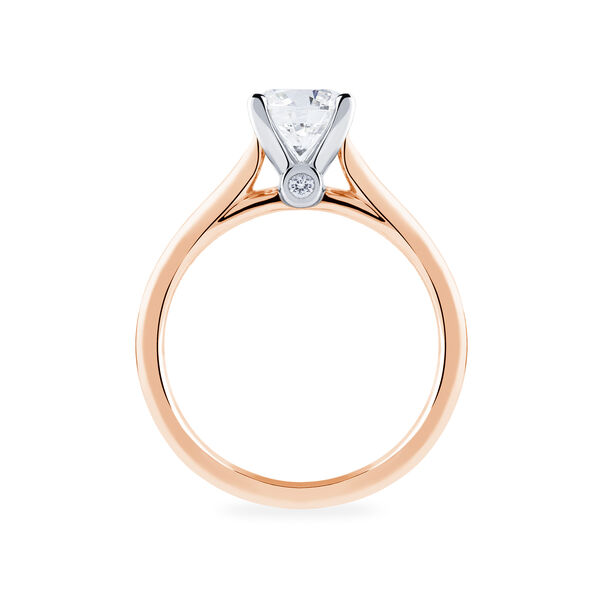 Bague de fiançailles en or rose à diamant solitaire rond