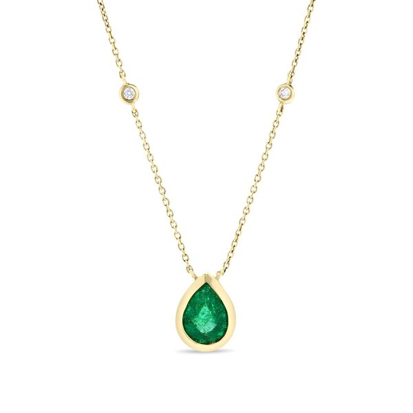 Pendentif en or jaune avec émeraude taille poire et diamants sertis clos