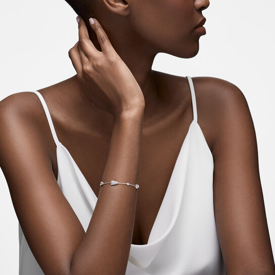 Model shot of white gold bracelet with three diamond elements from Birks Beekeeper image number 1