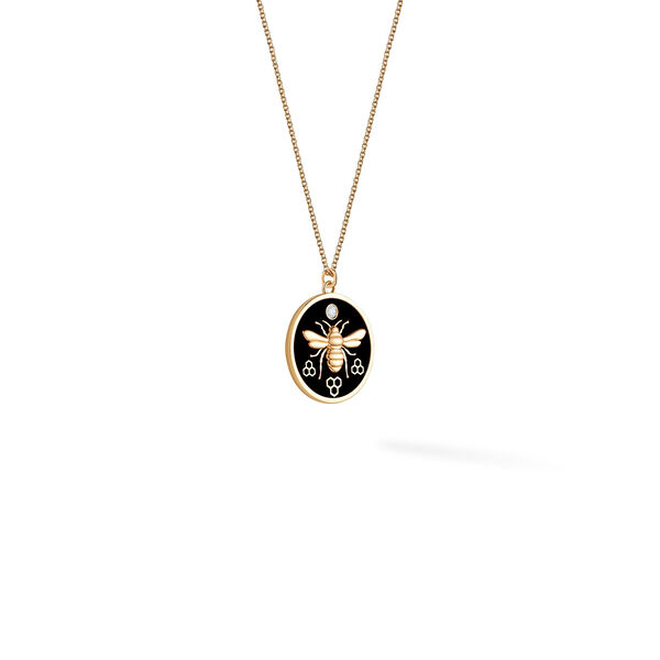 Grand médaillon rond en or jaune et émail noir avec diamant