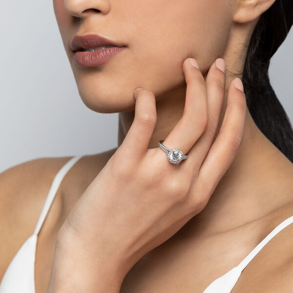 Round Solitaire Diamond Engagement Ring With Halo and Split Shank
