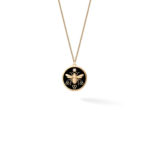 Grand médaillon rond en or jaune et émail noir avec diamant