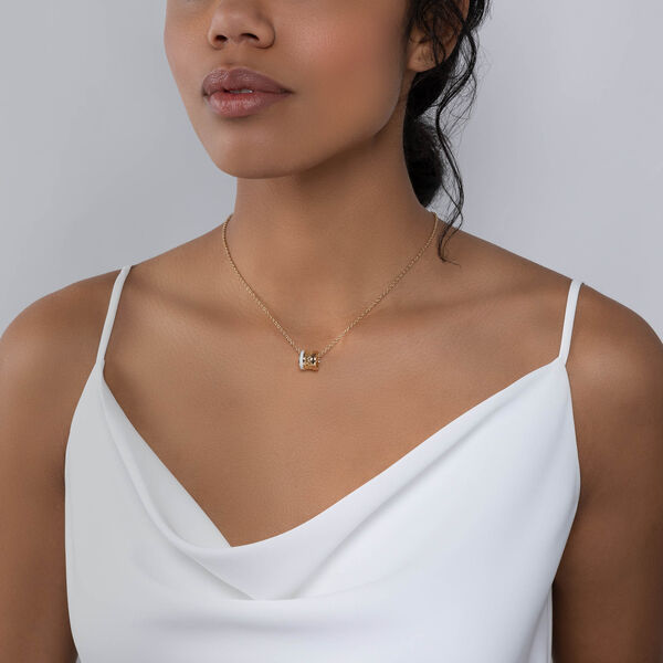 Pendentif or jaune et émail blanc