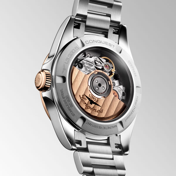 Conquest 30 mm automatique en acier inoxydable, coiffe or rose et diamants