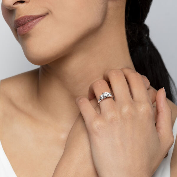 Round Three-Stone Diamond Engagement Ring with Sapphire Accent