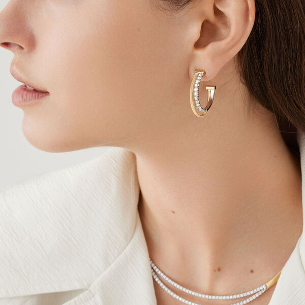 Boucles d'oreilles anneaux Masai en or jaune avec diamants