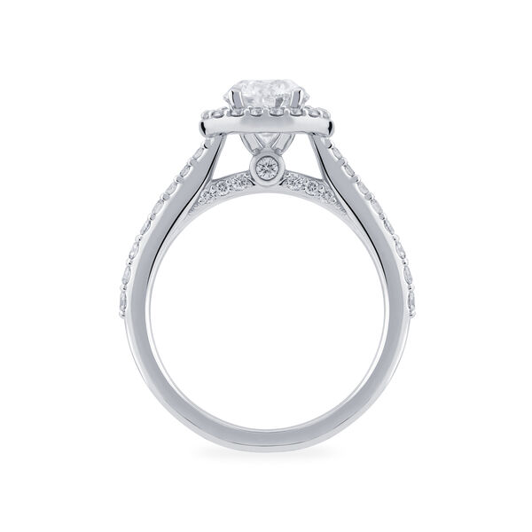 Oval Cut Diamond Engagement Ring With Single Halo And Diamond Band