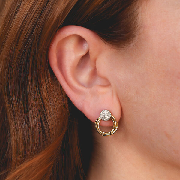 Boucles d'oreilles anneaux torsadées en or blanc avec pavé de diamants