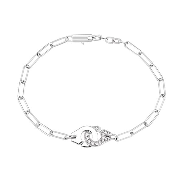 Bracelet Menottes dinh van R10 en or blanc. semi pavé de diamants