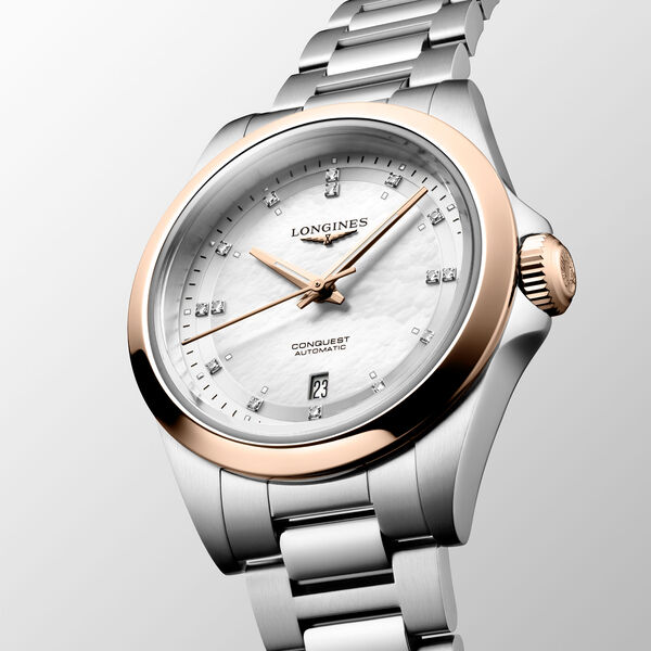 Conquest 30 mm automatique en acier inoxydable, coiffe or rose et diamants