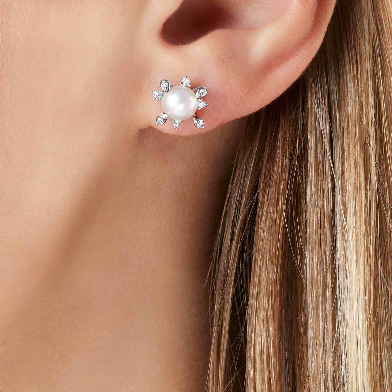 Yoko London Trend White Gold Pearl and Diamond Stud Earrings on model image number 1