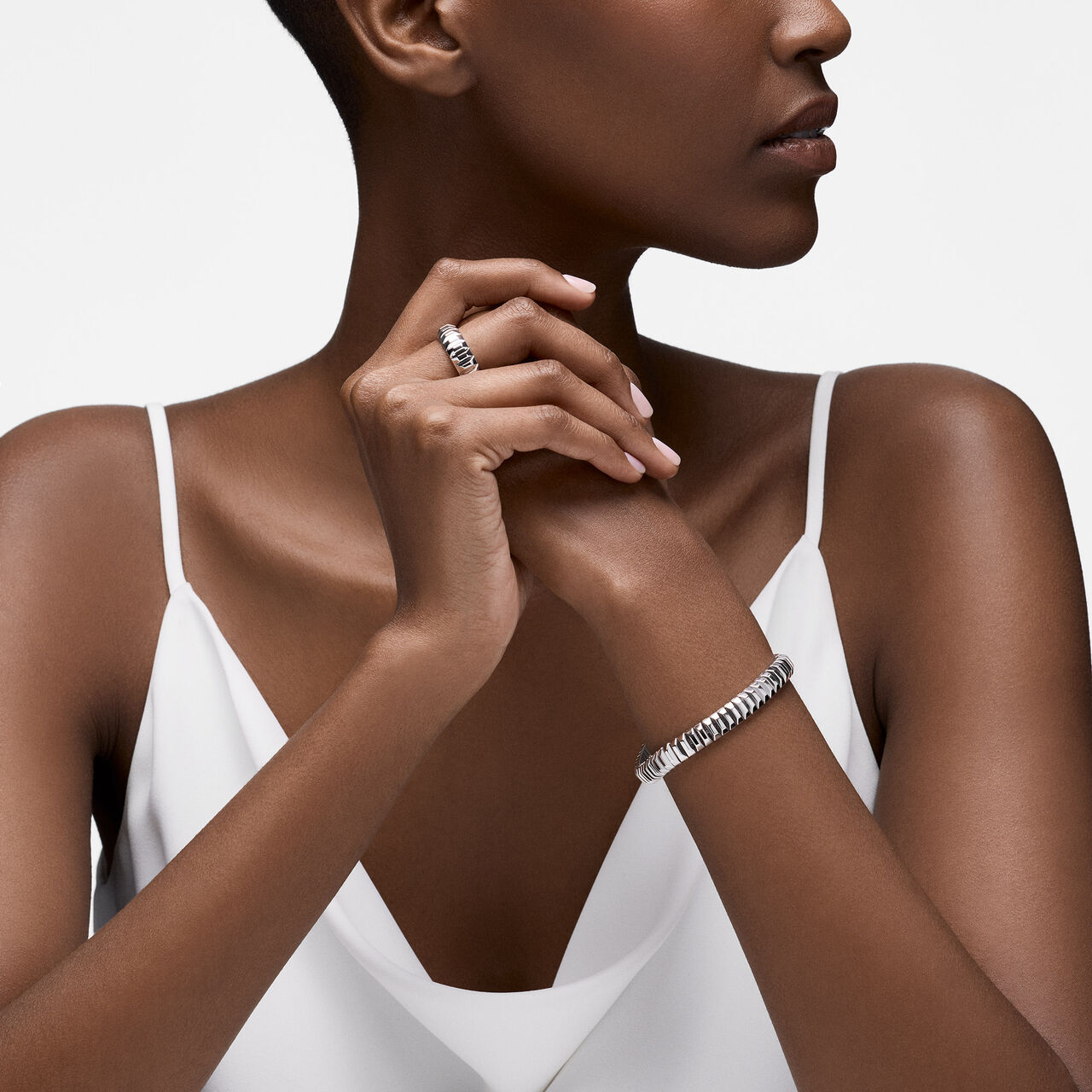 On-model view of Birks Essentials silver textured ring worn on the finger image number 1