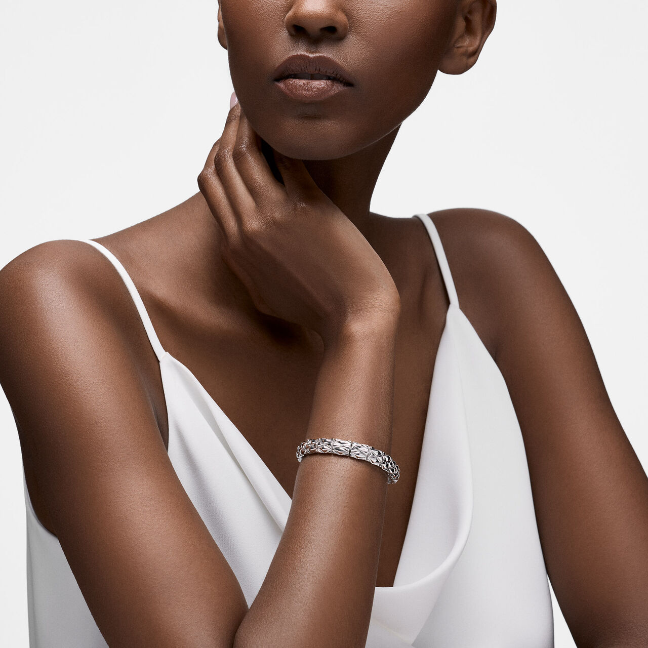 On-model view of Birks Essentials silver serpent bracelet worn on the wrist image number 1