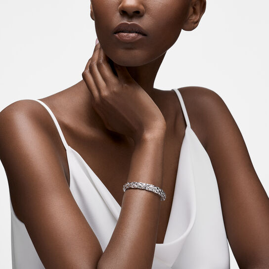 On-model view of Birks Essentials silver serpent bracelet worn on the wrist image number 1