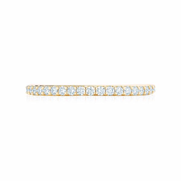 Alliance en or jaune sertie de 0.18 ct de diamants