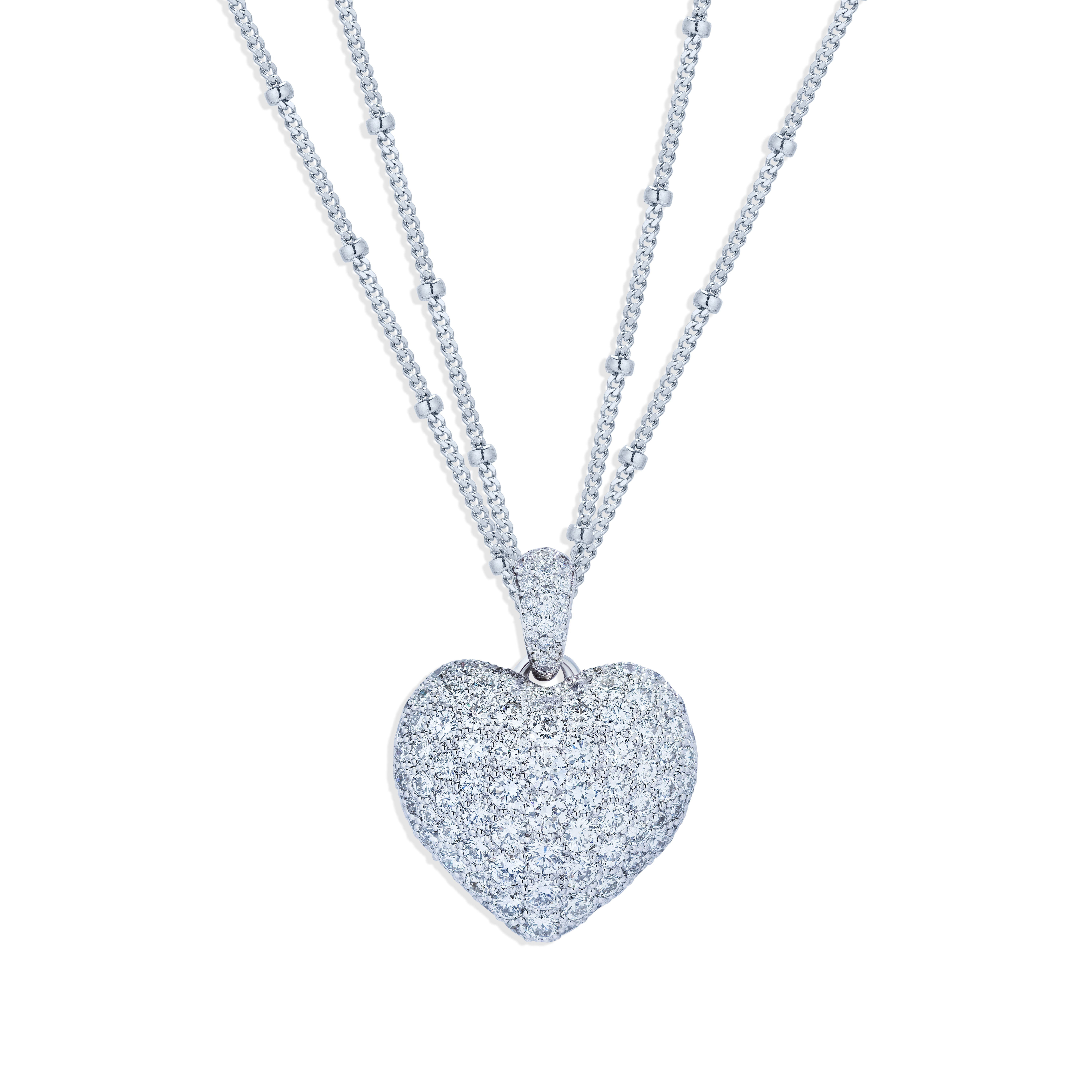 Diamond puff heart pendant in white gold
