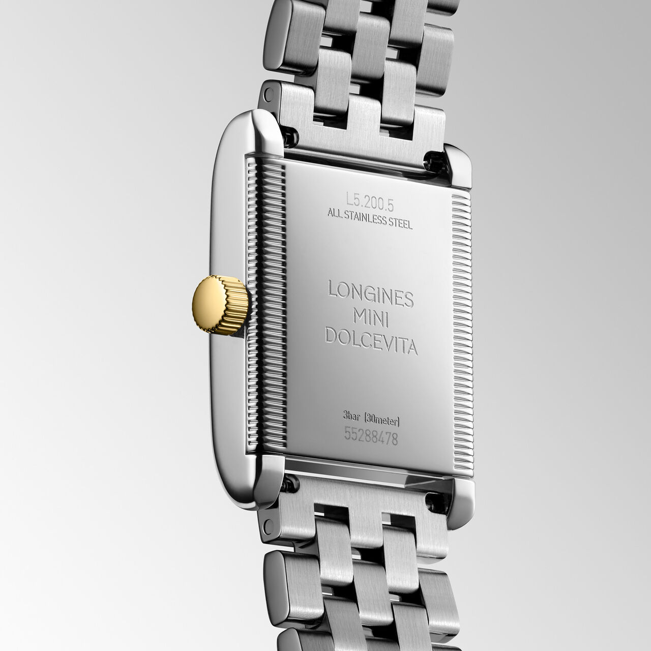 Rear view showing engraved caseback and two-tone bracelet image number 2