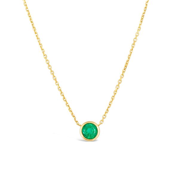 Pendentif en or jaune avec émeraude