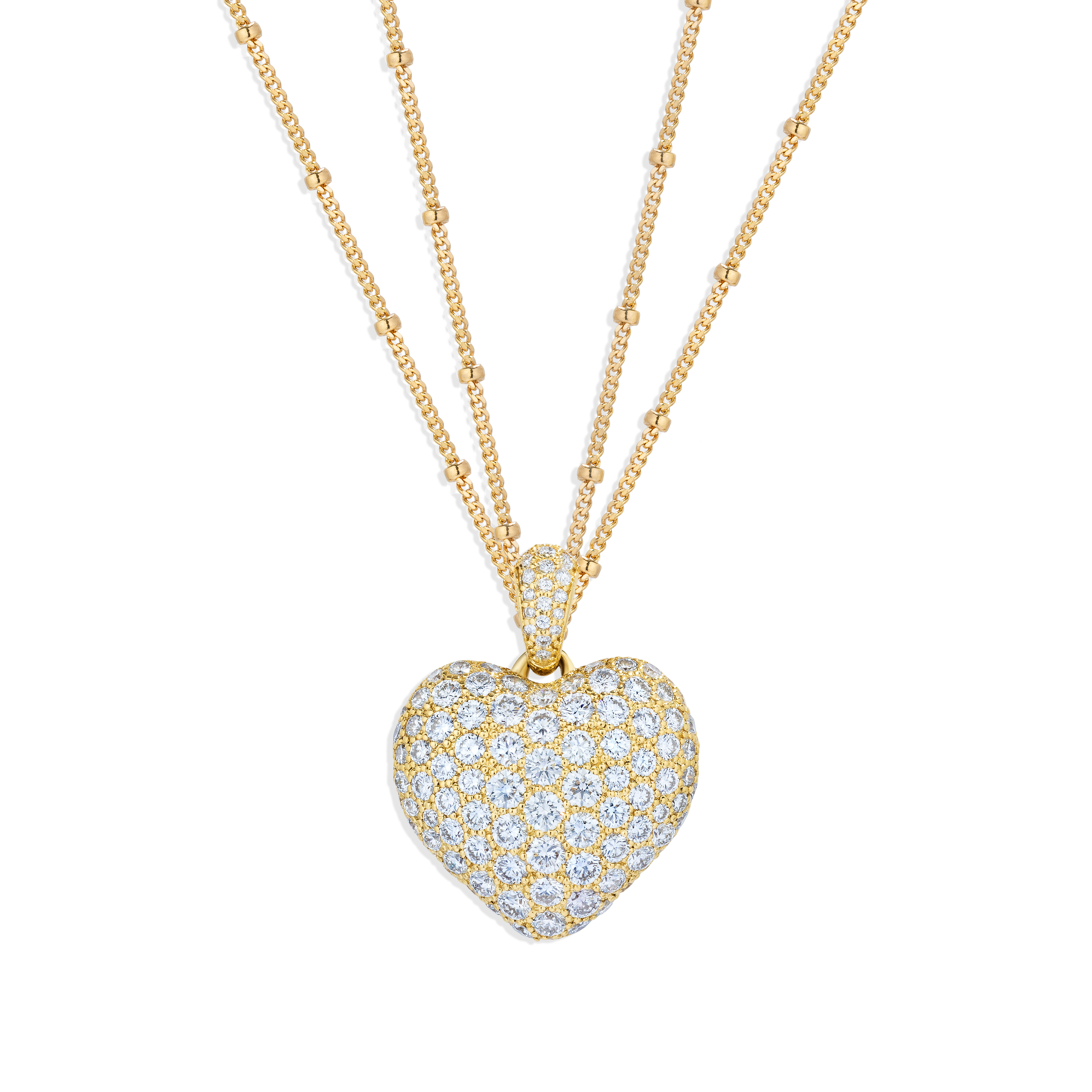 Diamond puff heart pendant in yellow gold