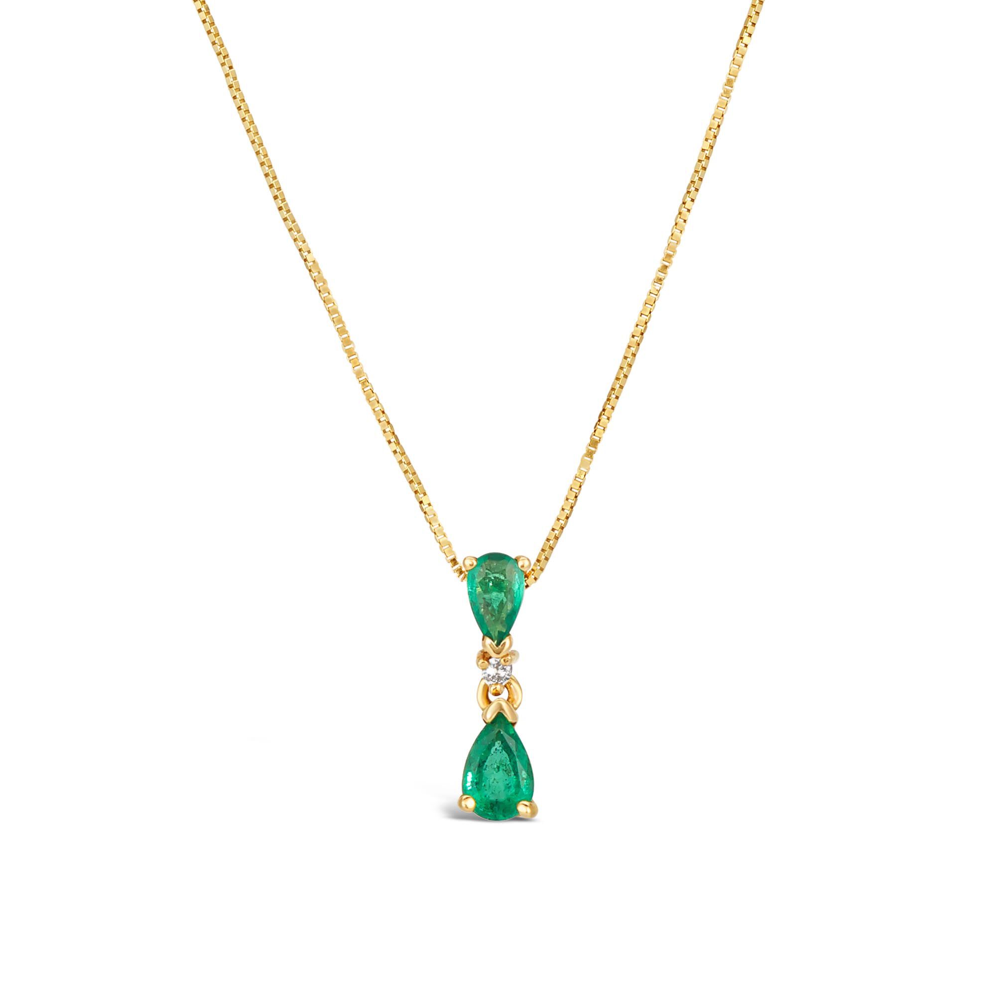 White gold emerald pendant discount