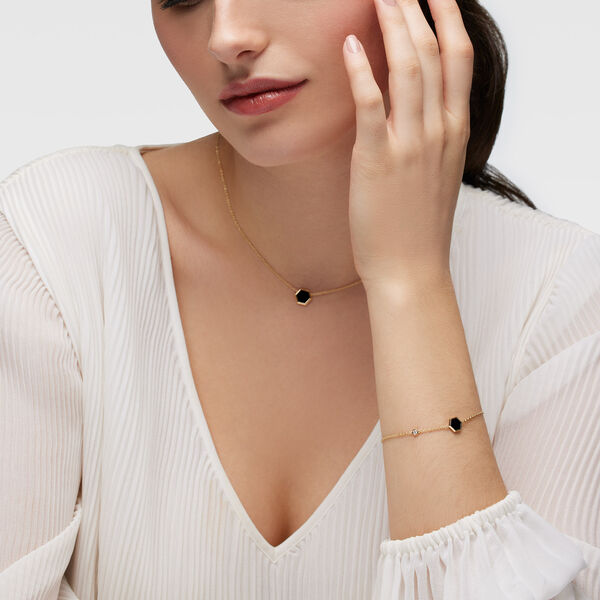 Bracelet en or jaune avec onyx et diamants