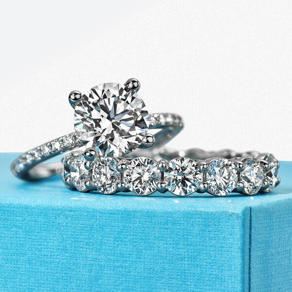 Platinum Round Solitaire Diamond Engagement Ring with Diamond Platinum Band