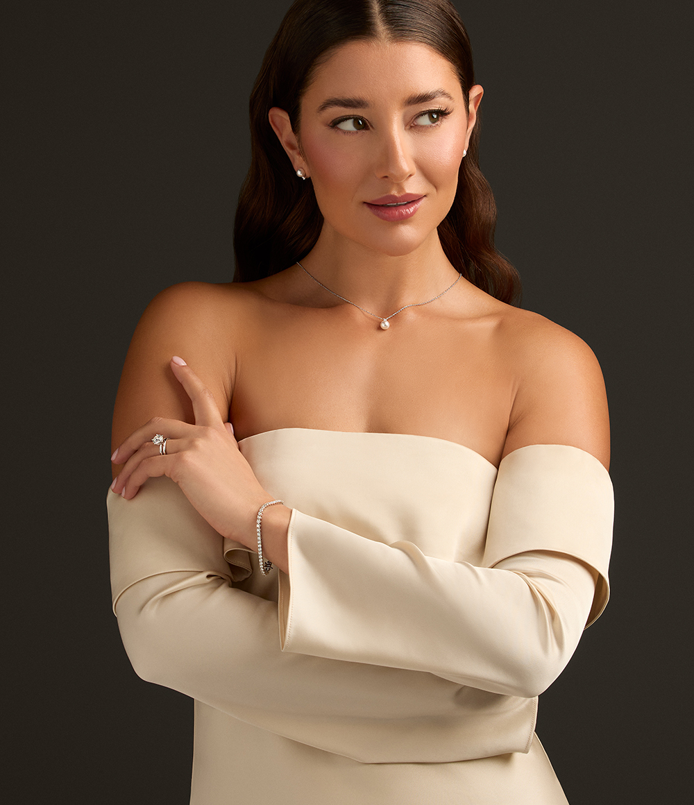A woman wearing Birks diamond bridal jewellery